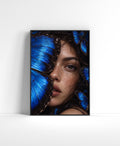 Close-up portrait wall art of a woman surrounded by vivid blue butterflies in a dark, dramatic editorial style.
