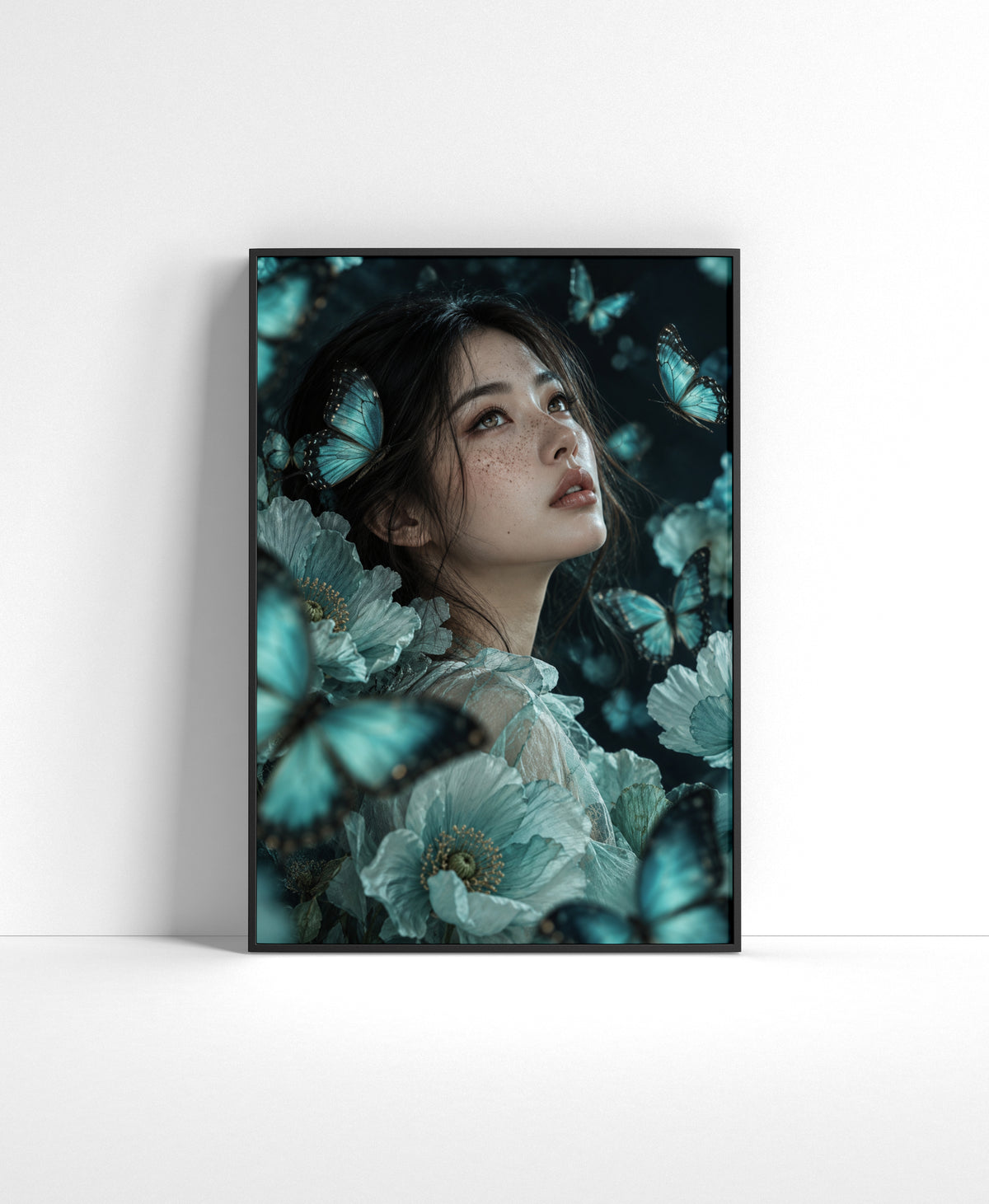 Dreamy floral wall art of a young woman surrounded by blue butterflies and soft aqua flowers.