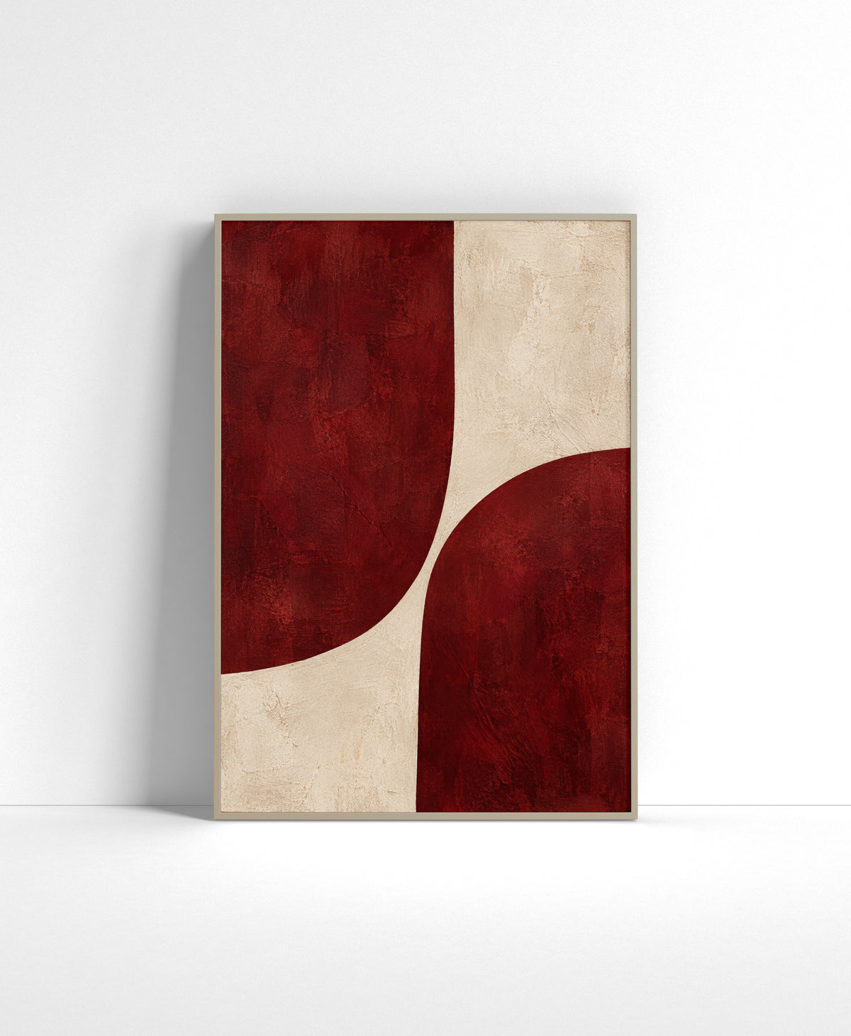 Crimson abstract wall art with two large curved red forms divided by a textured warm ivory negative space.